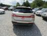 2017 Gold /Tan Lincoln MKX Reserve (2LMPJ6LR8HB) with an 3.7L V6 DOHC 24V engine, Automatic transmission, located at 15016 S Hwy 231, Midland City, AL, 36350, (334) 983-3001, 31.306210, -85.495277 - Photo#6